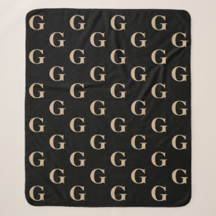Zwart en Tan Monogram Patroon Sherpa Deken
