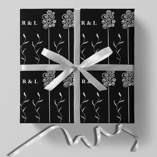 Zwart en wit minimalistisch krullend bloemmotief cadeaupapier