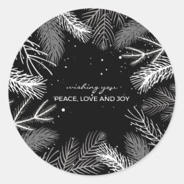 Zwart en wit pijnboomblad met sneeuw ronde sticker