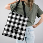 Zwart gebundeld patroonmonogrammus Bridesmaid Tote Bag<br><div class="desc">Deze zwarte gebufferde gebufferde bridesmaïde canvas tas is het perfecte geschenk voor haar. Het ontwerp kenmerkt een klassiek zwart-wit buffelvlakpatroon. Pas de tas aan met haar voornaam of achternaam.</div>