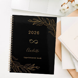 Zwart goud botanisch bladwerk elegant planner