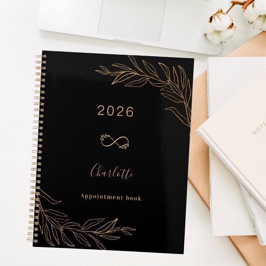 Zwart goud botanisch bladwerk elegant planner