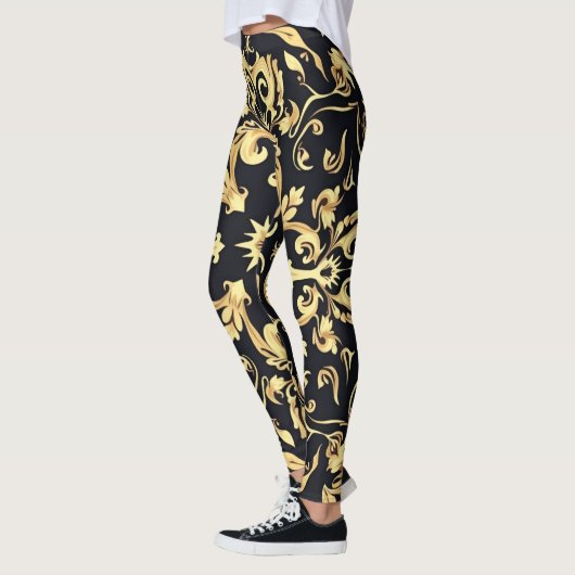 Zwart&goud embleem leggings (Links)