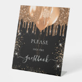 Zwart goudglitter druppelt het gastenboek aan reclamebord met voetstuk (Voorkant)