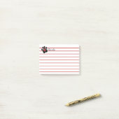 Zwart handschrift afdrukken en rood hart post-it® notes (Op bureau)