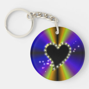 Zwart hart met sterren op paarse gele regenboog sleutelhanger