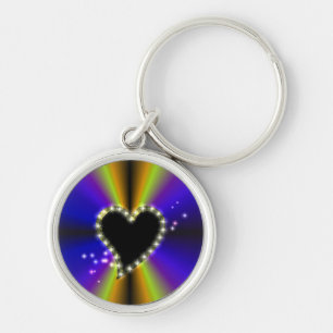 Zwart hart met sterren op paarse gele regenboog sleutelhanger