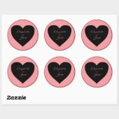 Zwart hart op roze achtergrond ronde sticker (Vel)