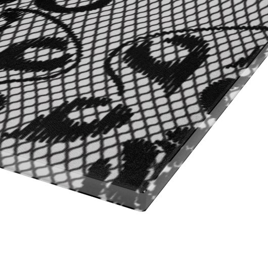 Zwart kant patroon op witte achtergrond snijplank (Hoek)