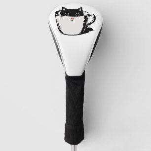 Zwart katje met rode neus verstopt in een kopje golfheadcover