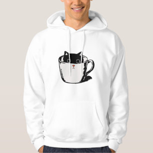 Zwart katje met rode neus verstopt in een kopje hoodie