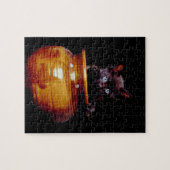 Zwart keuten in keramisch vet, zwarte achtergrond legpuzzel (Horizontaal)