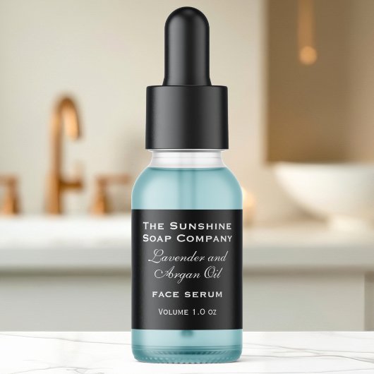 Zwart klein flesje druppelaar flesetiket etiket