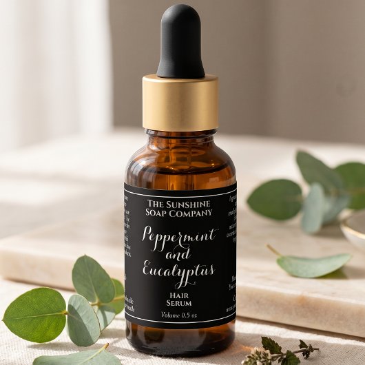 Zwart krullend tekst cosmetica druppelfles label