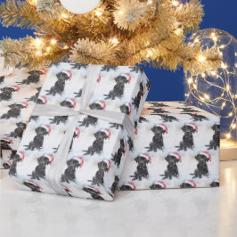 Zwart lab met kerstkerstkerstcadeau of foto's met cadeaupapier