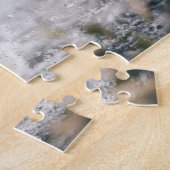 Zwart labrador speelt fets in water legpuzzel (Zijkant)