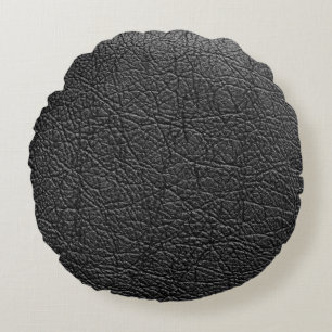 Zwart leer: naadloze close-up textuur. rond kussen