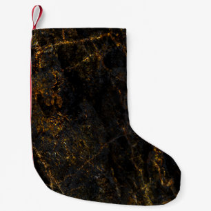 Zwart marmer, gouden aderen, textuur. kleine kerstsok