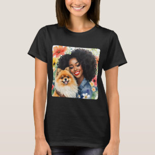  zwart meisje met pomeraanse hond bloemigen t-shirt