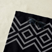 Zwart met donkergrijs strandlaken (In situ)