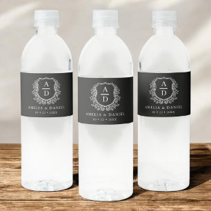 Zwart Monogram Bruiloft Bloemen Crest Waterfles Etiket