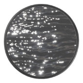 Zwart mousserend water hockey puck (Voorkant)
