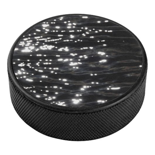 Zwart mousserend water hockey puck (3/4)