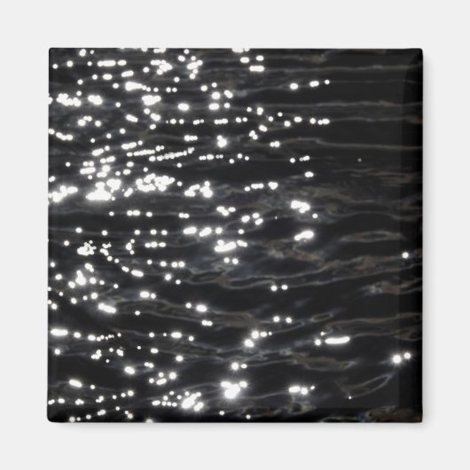 Zwart mousserend water magneet (Voorkant)