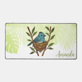 Zwart-Naped Monarch genesteld tussen de bladeren Bureaumat