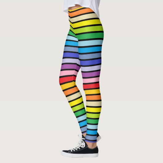 Zwart omlijnd brederspectrum regenboogstrips leggings (Links)