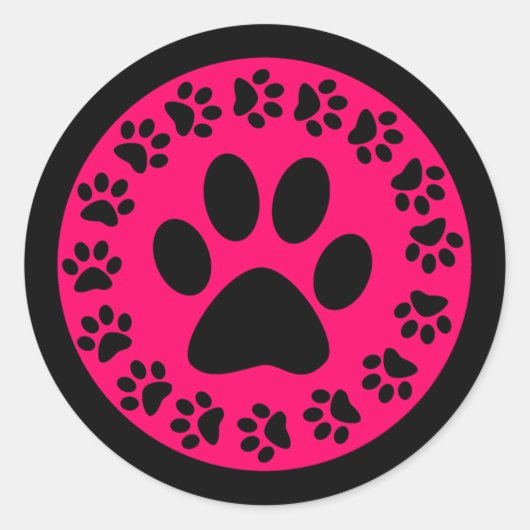 Zwart op roze paw afdrukken ronde sticker (Voorkant)