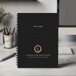 Zwart Ronde Gouden Logo Naam Professioneel bedrijf Planner<br><div class="desc">Blijf op orde en verhoog uw professionele afbeelding met onze Custom Spiral Planner, met een verfijnd zwart leren ontwerp dat sophisticatie combineert met functionaliteit. Met een aanpasbare vierkante ruimte op de cover kunt u uw zakelijke logo prominent weergeven over een gouden textuur, terwijl twee extra regels bewerkbare tekst ruimte bieden...</div>