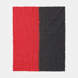Zwart-rood gebreid: gestreepte close-up. fleece deken