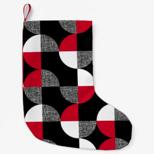 Zwart, rood, wit geometrisch geruite patroon. kleine kerstsok