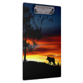 Zwart silhouet van Wolf, vogels en bomen in de zon Klembord (Rechts)