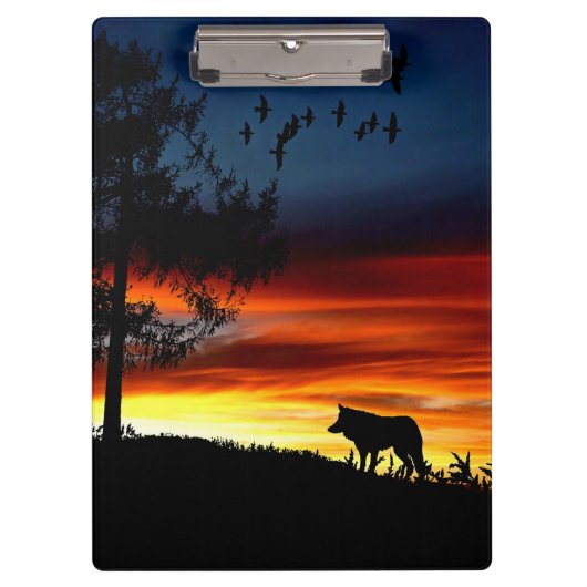 Zwart silhouet van Wolf, vogels en bomen in de zon Klembord (Voorkant)