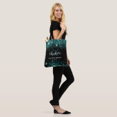 Zwart teal groene glinsterende monogram tote bag (Op model)