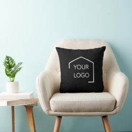Zwart vastgoedlogo op decoratieve kussen of cadeau