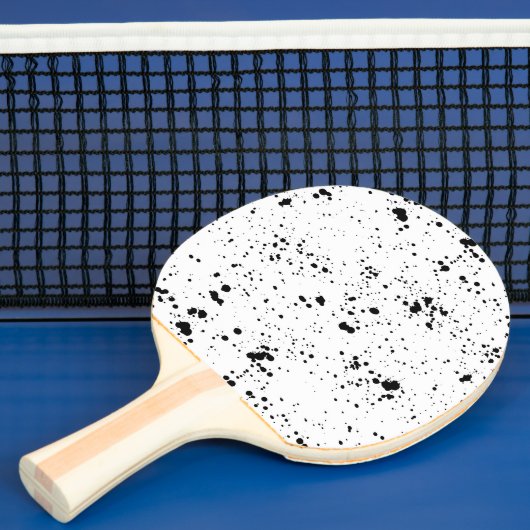 Zwart verf splatter patroon tafeltennisbatje (Insitu)
