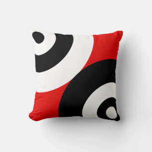 Zwart-wit abstract cirkels op rood kussen