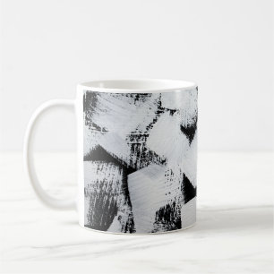 Zwart wit, abstract geschilderd canvas. koffiemok