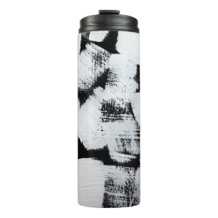 Zwart wit, abstract geschilderd canvas. thermosbeker