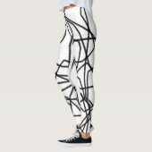 Zwart-wit abstract patroon leggings (Links)