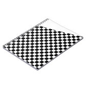 Zwart-wit checker schuin boven notitieboek (Linkerzijde)