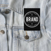Zwart-wit cirkelvormig badge-logo button (Insitu)