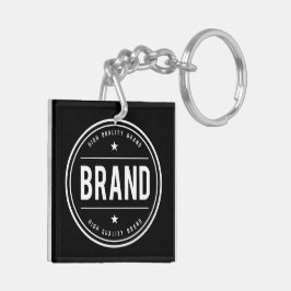 Zwart-wit cirkelvormig badge-logo sleutelhanger