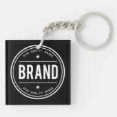 Zwart-wit cirkelvormig badge-logo sleutelhanger (Achterkant)