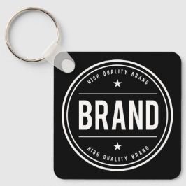 Zwart-wit cirkelvormig badge-logo sleutelhanger