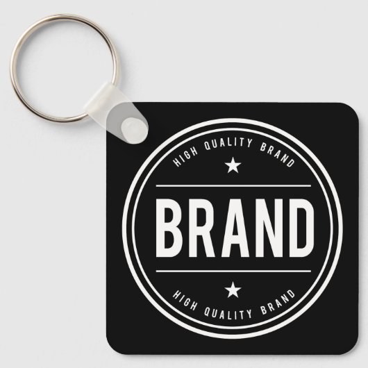 Zwart-wit cirkelvormig badge-logo sleutelhanger (Voorkant)