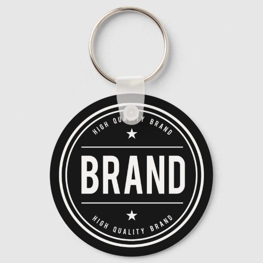 Zwart-wit cirkelvormig badge-logo sleutelhanger (Voorkant)